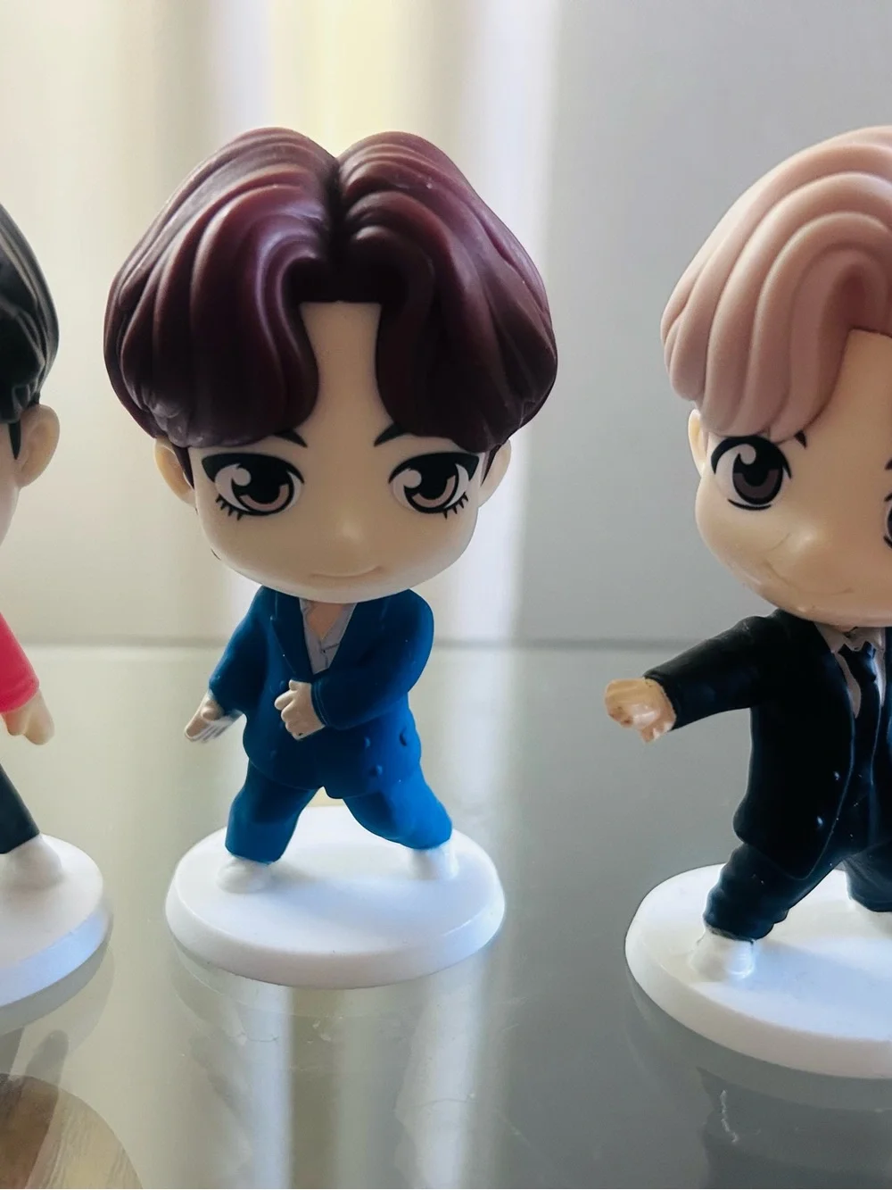 4 BTS TinyTAN Throwback Edition collectible figures